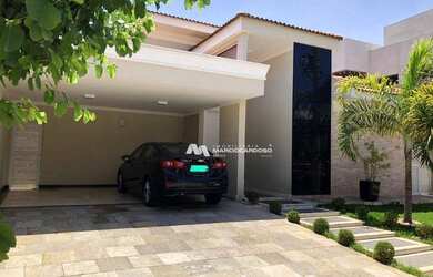 Imagem: A casa em condomínio possui 4 Dormitórios, 5 Banheiros, 4