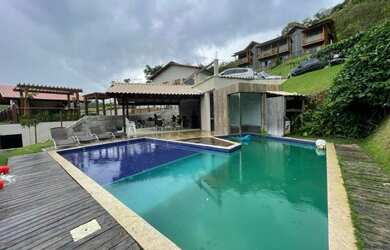 Imagem: A casa em condomínio possui 5 Dormitórios, 5 Banheiros, 5