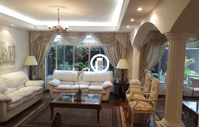 Imagem: A casa possui 5 Dormitórios, 5 Banheiros, 5 Vagas na garagem