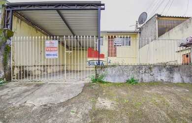 Imagem: A casa possui 2 Dormitórios, 1 Banheiro, 2 Vagas na garagem