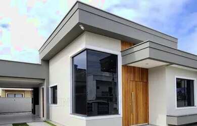 Imagem: A casa possui 3 Dormitórios, 2 Banheiros, 2 Vagas na garagem