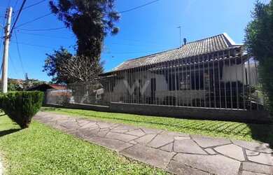 Imagem: A casa possui 3 Dormitórios, 3 Banheiros, 1 Vaga na garagem