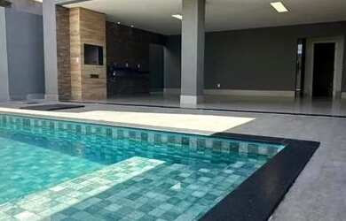 Imagem: A casa em condomínio possui 4 Dormitórios, 3 Banheiros, 2