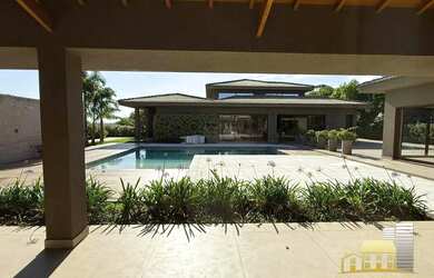 Imagem: A casa em condomínio possui 5 Dormitórios, 5 Banheiros, 5