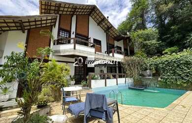 Imagem: A casa em condomínio à venda possui 4 Dormitórios, 5 Banheiros