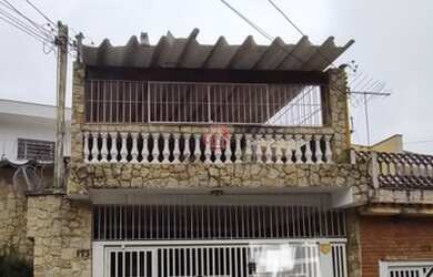 Imagem: A casa possui 3 Dormitórios, 3 Banheiros, 2 Vagas na garagem