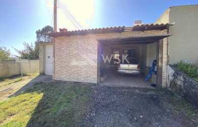 Imagem: A casa possui 2 Dormitórios, 1 Banheiro, 1 Vaga na garagem