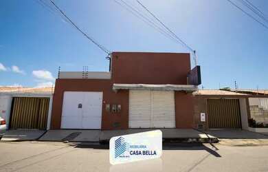 Imagem: A casa possui 3 Dormitórios, 2 Banheiros, 1 Vaga na garagem