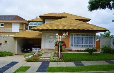 Imagem: A casa em condomínio possui 3 Dormitórios, 3 Banheiros, 2