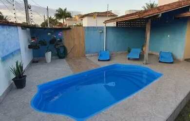 Imagem: A casa possui 4 Dormitórios, 5 Banheiros, 3 Vagas na garagem