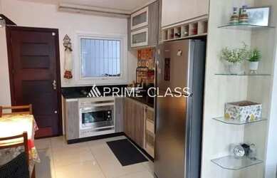 Imagem: A casa possui 3 Dormitórios, 2 Banheiros, 2 Vagas na garagem