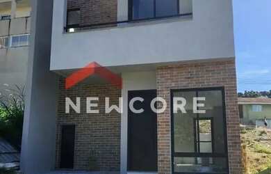 Imagem: A casa possui 2 Dormitórios, 3 Banheiros, 1 Vaga na garagem