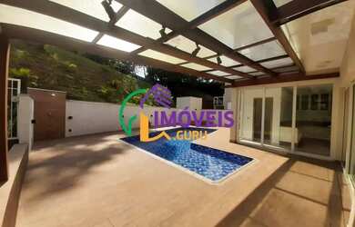 Imagem: A casa em condomínio possui 4 Dormitórios, 5 Banheiros, 4