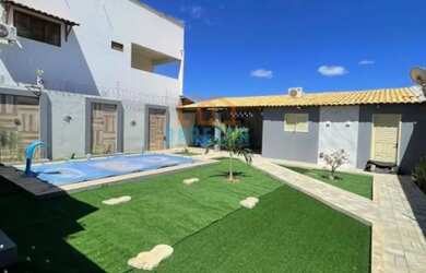 Imagem: A casa possui 3 Dormitórios, 2 Banheiros, 360m² de Área e