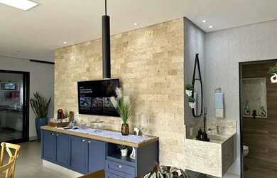 Imagem: A casa possui 3 Dormitórios, 4 Banheiros, 3 Vagas na garagem