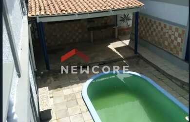 Imagem: A casa possui 4 Dormitórios, 3 Banheiros, 3 Vagas na garagem