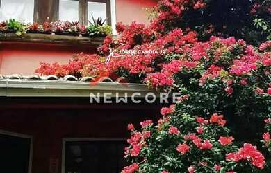 Imagem: A casa possui 5 Dormitórios, 5 Banheiros, 5 Vagas na garagem