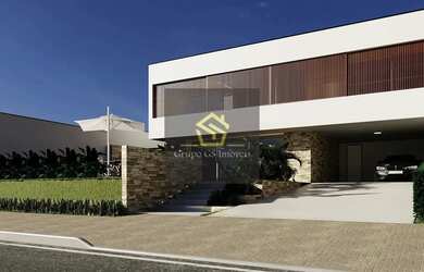 Imagem: A casa possui 3 Dormitórios, 5 Banheiros, 4 Vagas na garagem