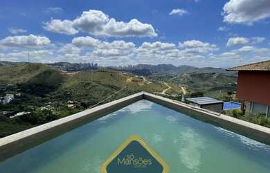 Imagem: A casa em condomínio possui 4 Dormitórios, 5 Banheiros, 3