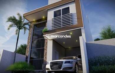 Imagem: A casa possui 3 Dormitórios, 4 Banheiros, 2 Vagas na garagem