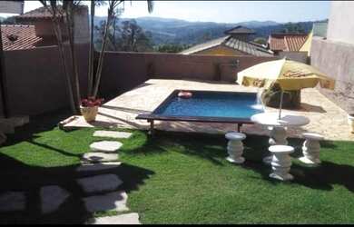 Imagem: A casa possui 2 Dormitórios, 3 Banheiros, 3 Vagas na garagem