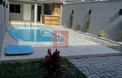 Imagem: A casa possui 4 Dormitórios, 3 Banheiros, 4 Vagas na garagem