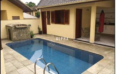 Imagem: A casa em condomínio possui 4 Dormitórios, 5 Banheiros, 4