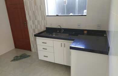 Imagem: A casa possui 2 Dormitórios, 2 Banheiros, 1 Vaga na garagem