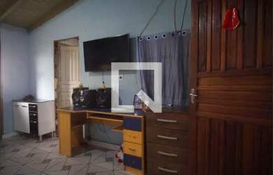 Imagem: A casa possui 2 Dormitórios, 1 Banheiro, 1 Vaga na garagem