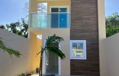 Imagem: A casa possui 3 Dormitórios, 3 Banheiros, 2 Vagas na garagem