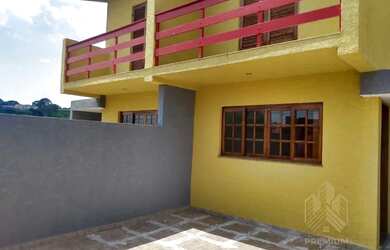 Imagem: A casa possui 2 Dormitórios, 3 Banheiros, 2 Vagas na garagem