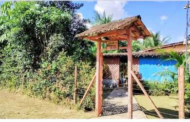 Imagem: A casa possui 4 Dormitórios, 2 Banheiros, 200m² de Área