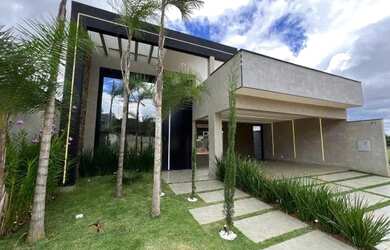 Imagem: A casa possui 3 Dormitórios, 5 Banheiros, 4 Vagas na garagem