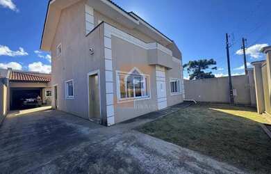 Imagem: A casa possui 4 Dormitórios, 4 Banheiros, 4 Vagas na garagem