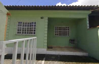 Imagem: A casa possui 2 Dormitórios, 1 Banheiro, 1 Vaga na garagem