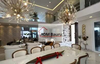 Imagem: A casa possui 3 Dormitórios, 5 Banheiros, 5 Vagas na garagem