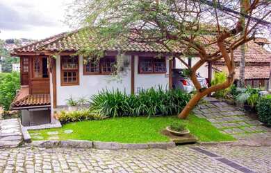 Imagem: A casa em condomínio possui 4 Dormitórios, 3 Banheiros, 2