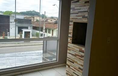 Imagem: O apartamento possui 2 Dormitórios, 1 Banheiro, 1 Vaga na garagem