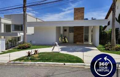 Imagem: A casa possui 5 Dormitórios, 5 Banheiros, 4 Vagas na garagem