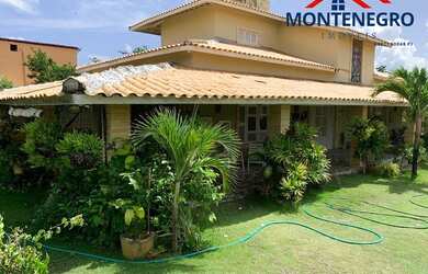 Imagem: A casa possui 5 Dormitórios, 4 Banheiros, 5 Vagas na garagem