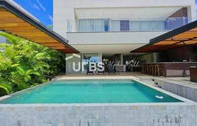 Imagem: A casa possui 4 Dormitórios, 5 Banheiros, 4 Vagas na garagem