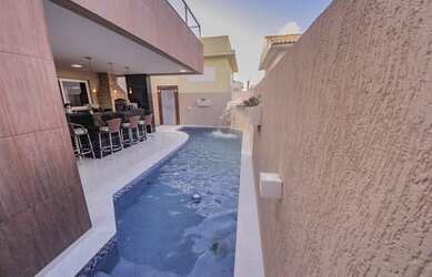 Imagem: A casa em condomínio possui 5 Dormitórios, 5 Banheiros, 5