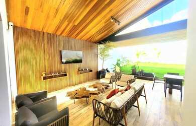 Imagem: A casa possui 3 Dormitórios, 4 Banheiros, 4 Vagas na garagem