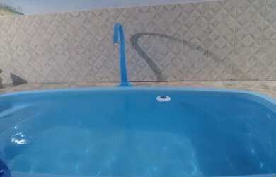 Imagem: A casa possui 2 Dormitórios, 2 Vagas na garagem e Varanda e