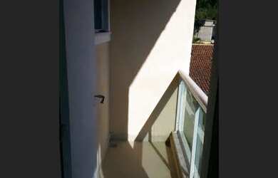 Imagem: A casa em condomínio possui 3 Dormitórios, 3 Banheiros, 2