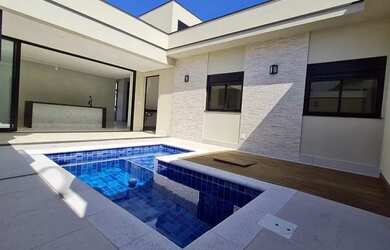 Imagem: A casa em condomínio possui 3 Dormitórios, 4 Banheiros, 3