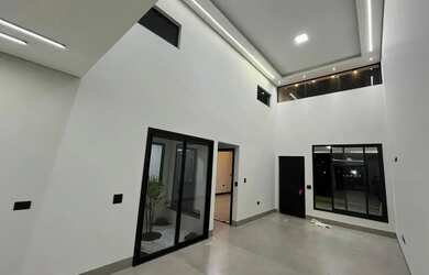 Imagem: A casa possui 3 Dormitórios, 5 Banheiros, 4 Vagas na garagem