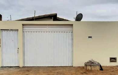 Imagem: A casa possui 2 Dormitórios, 3 Banheiros, 1 Vaga na garagem