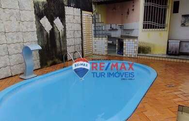 Imagem: A casa possui 3 Dormitórios, 4 Banheiros, 3 Vagas na garagem