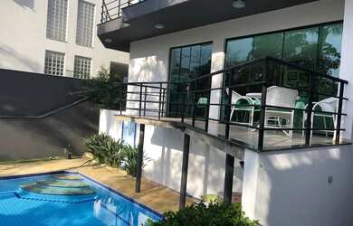 Imagem: A casa em condomínio possui 4 Dormitórios, 5 Banheiros, 4